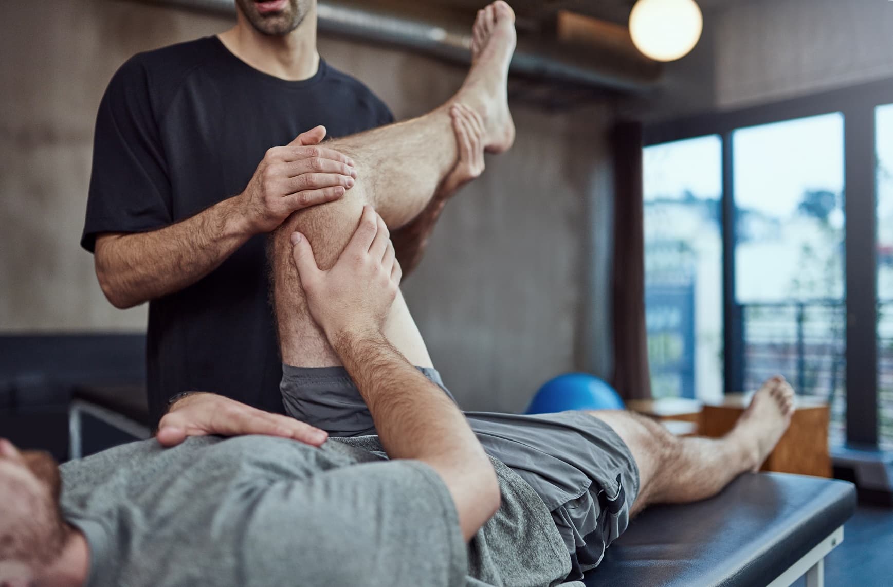 Physiotherapist treating a patient at Healing Hands